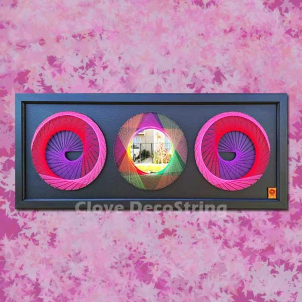 Espiral doble caracol en degradé, rosado con espejo central y marco negro 54x134 cm